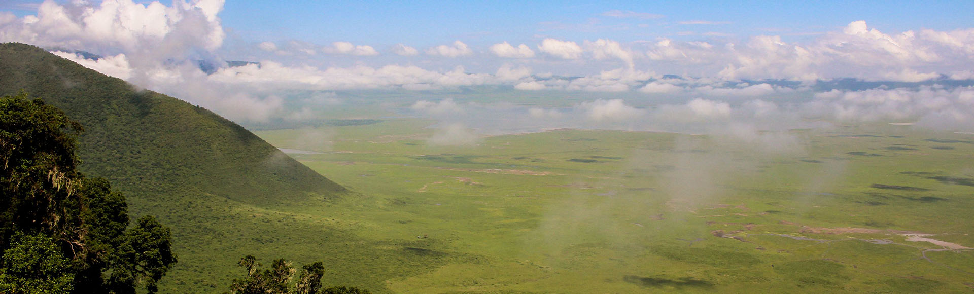 Panoramic view of the Ngorongoro Crater caldera from the rim, with its lake and plains on the crater floor